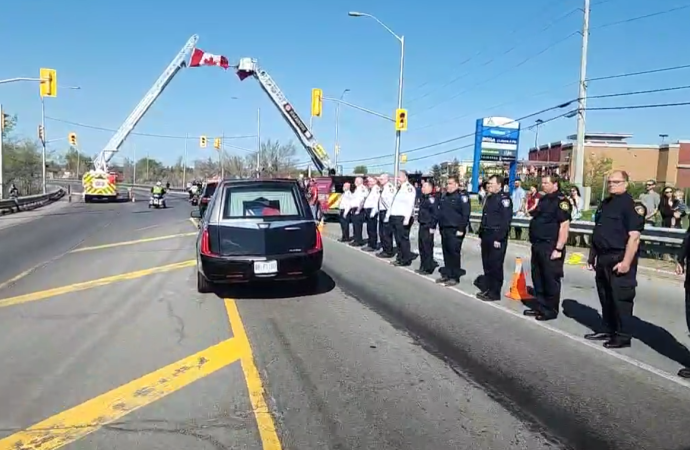 Police procession escorts fallen OPP officer’s body home to Rockland, Ont.